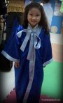 in graduation robe